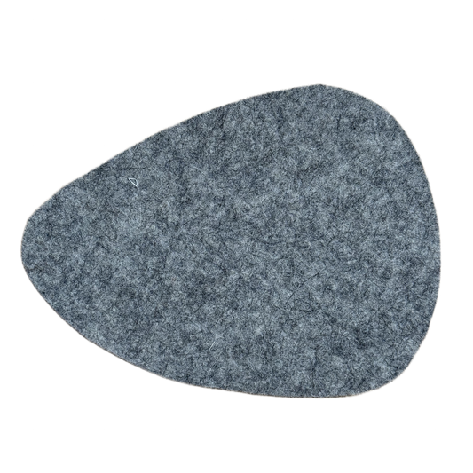 Stone-shaped coaster made from 100% natural wool, in neutral tone - back view